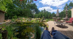 BEST POND patio feet up (100 of 1).jpg