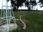 New landscaping area from windmill to wisteria arbor.JPG