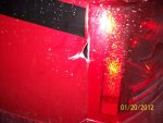 Hole to side of left rear lights.JPG Hole to side of left rear lights.JPG