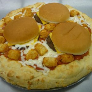 One of our more unusual fast food specials was this cheeseburger pizza. The pizza dough and sauce were made from scratch. Tater tots and flame grilled cheese burgers top this unique product.