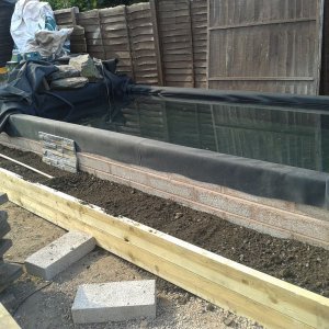Raised planter bed being filled #2