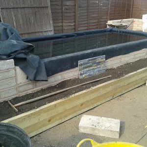 Raised planter bed being filled #1