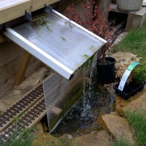 Fish pond outflow and Splash pool