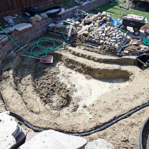 Bird's eye view of pond progress after two days of rain.