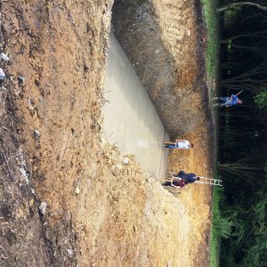 the concrete screed going down in the swim zone
