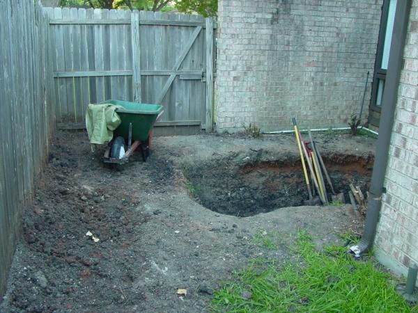 Digging my new pond. Tx black clay sure it tuff.