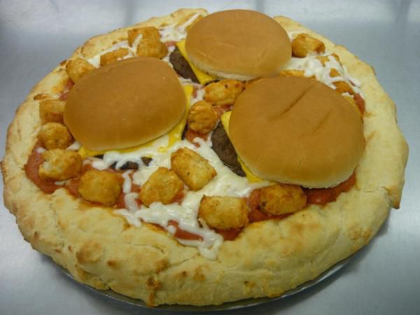 One of our more unusual fast food specials was this cheeseburger pizza. The pizza dough and sauce were made from scratch. Tater tots and flame grilled cheese burgers top this unique product.
