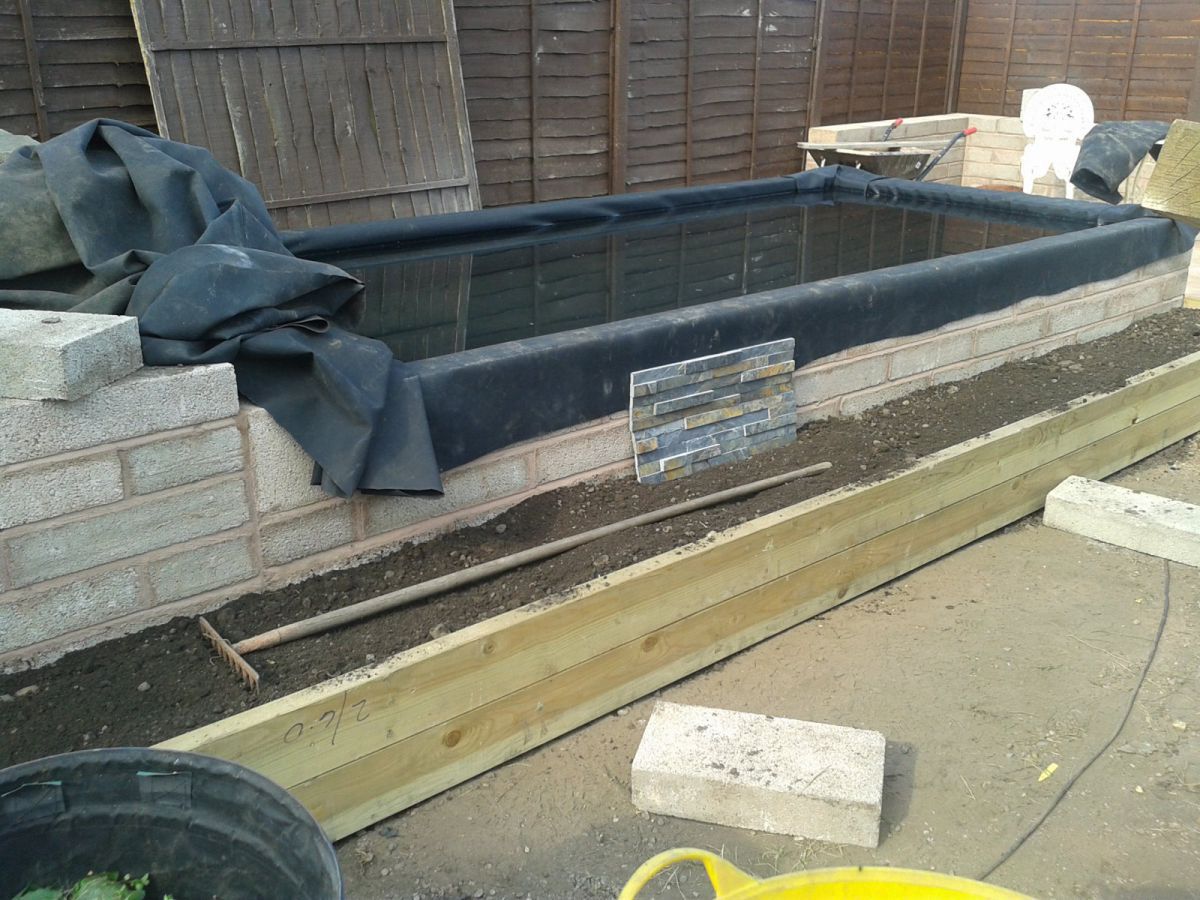 Raised planter bed being filled #1