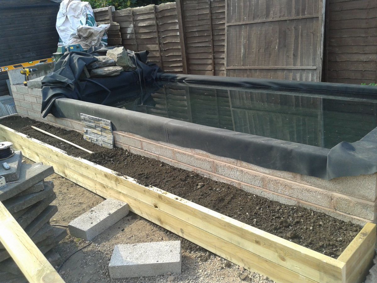 Raised planter bed being filled #2