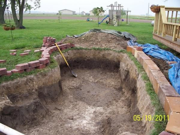 Starting to line outside edge with block and landscape stones