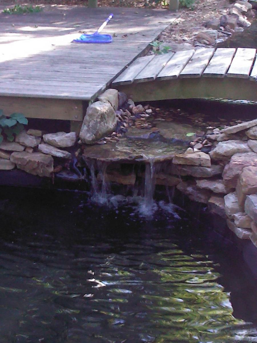 stream falling into big pond