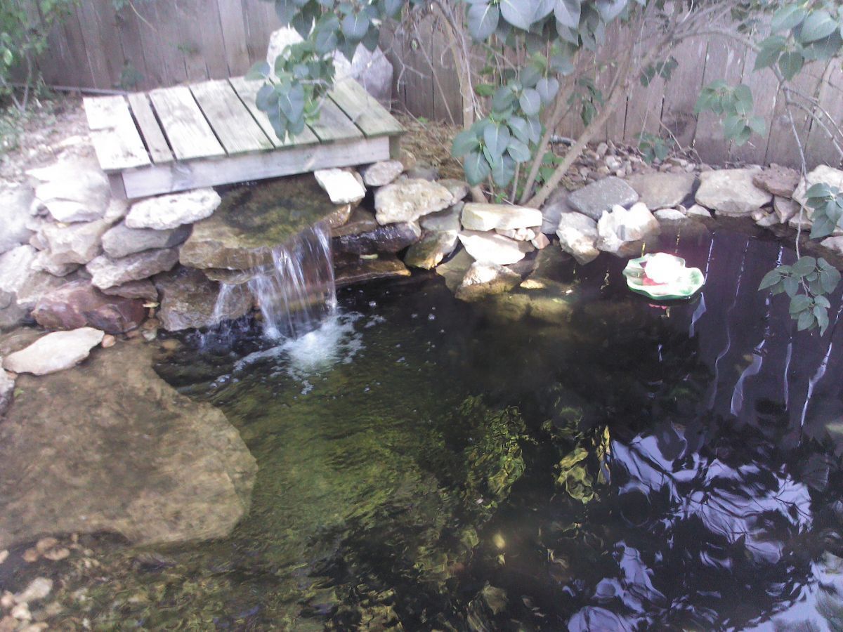 water fall into the upper pond