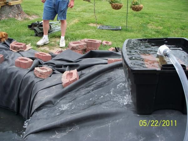 Water overfloring DIY filterfor first time - ended up putting 4x4's under filter tub, to tilt it so water could run through all filter media, back into pond, once pond was full.