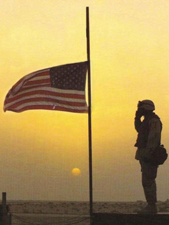 flag_american_soldier_salutes_half_mast_us_flag-01.jpg