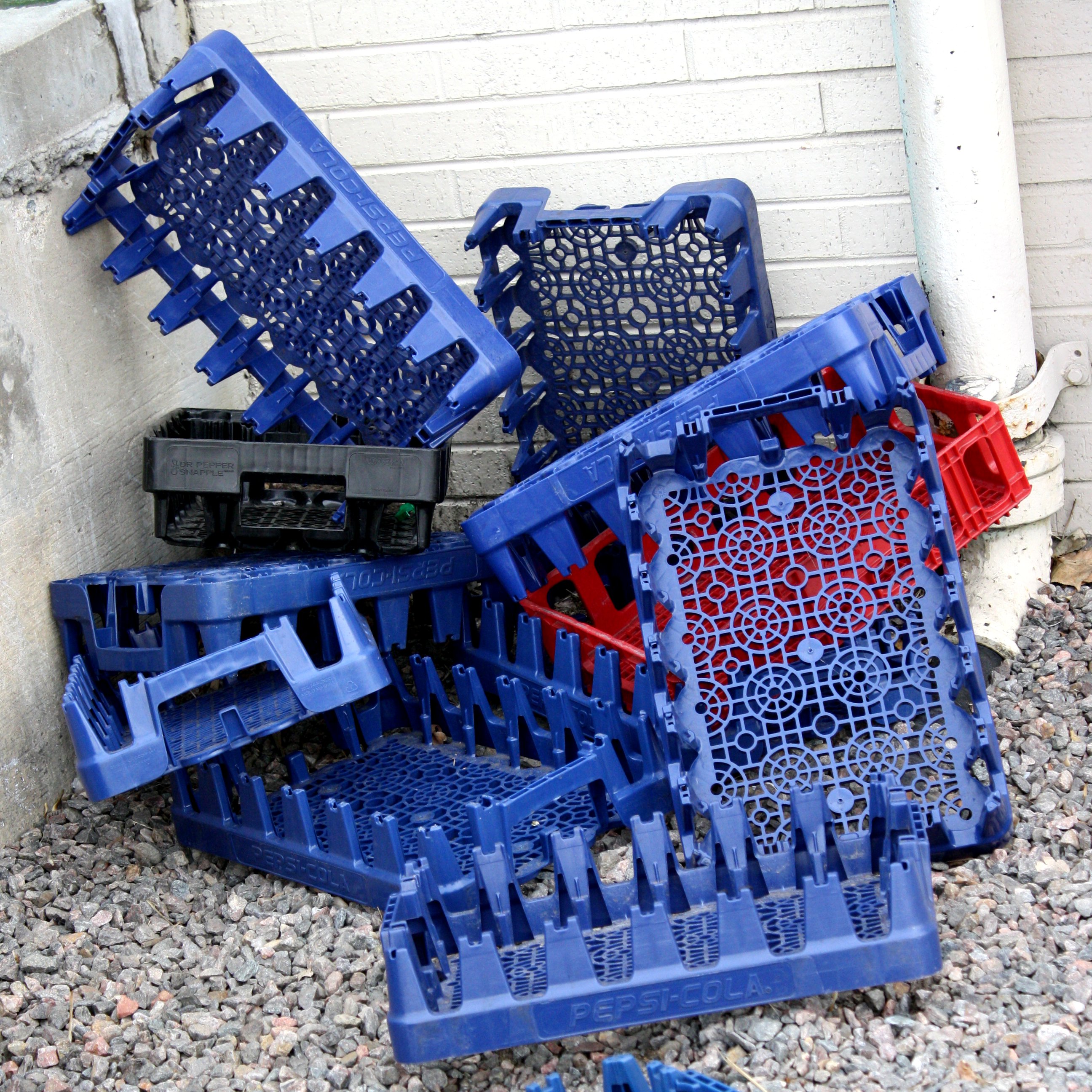 pile-of-plastic-soda-crates.jpg